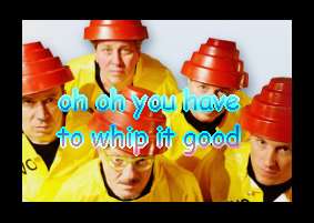 a stamp with a picture of the band devo that says 'oh oh you have to whip it good'